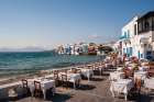 Restaurant tables on the seaside in the Little Venice neighborhood Chora-Mykonos Island-Greece Art Print